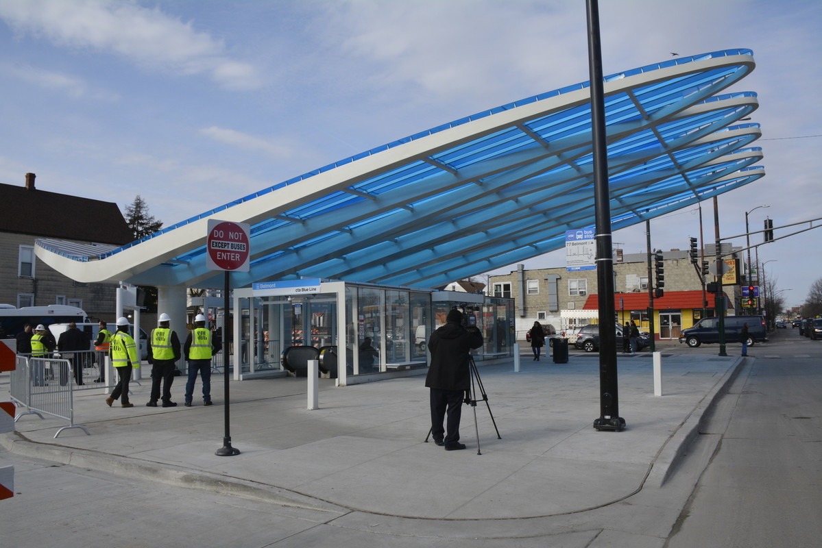 Image of new completed architectural canopy constructed for the Belmont Blue Line station entrance and bus boarding area. 