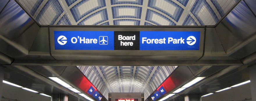 Sign showing trains to either O'Hare or Forest Park on each platform side