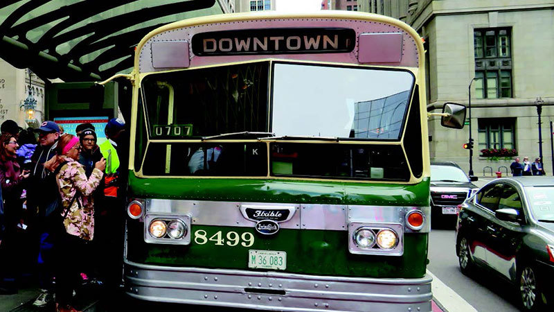 Bus 8499 boarding at a Loop Link station