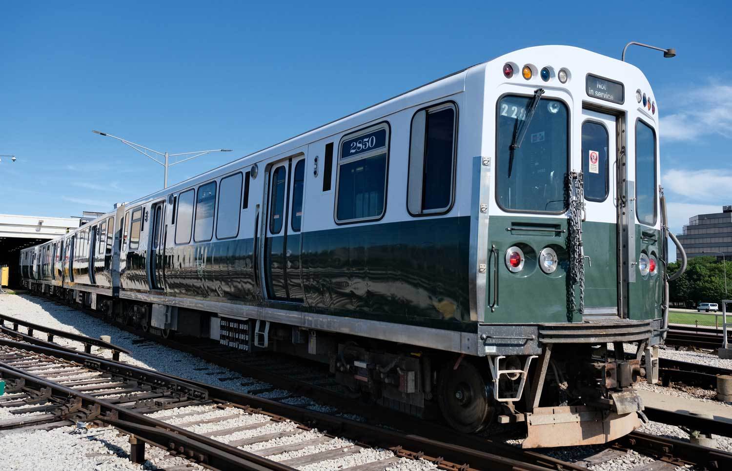 Modern railcars featuring vintage-themed wrap of the 2000-Series railcars. 