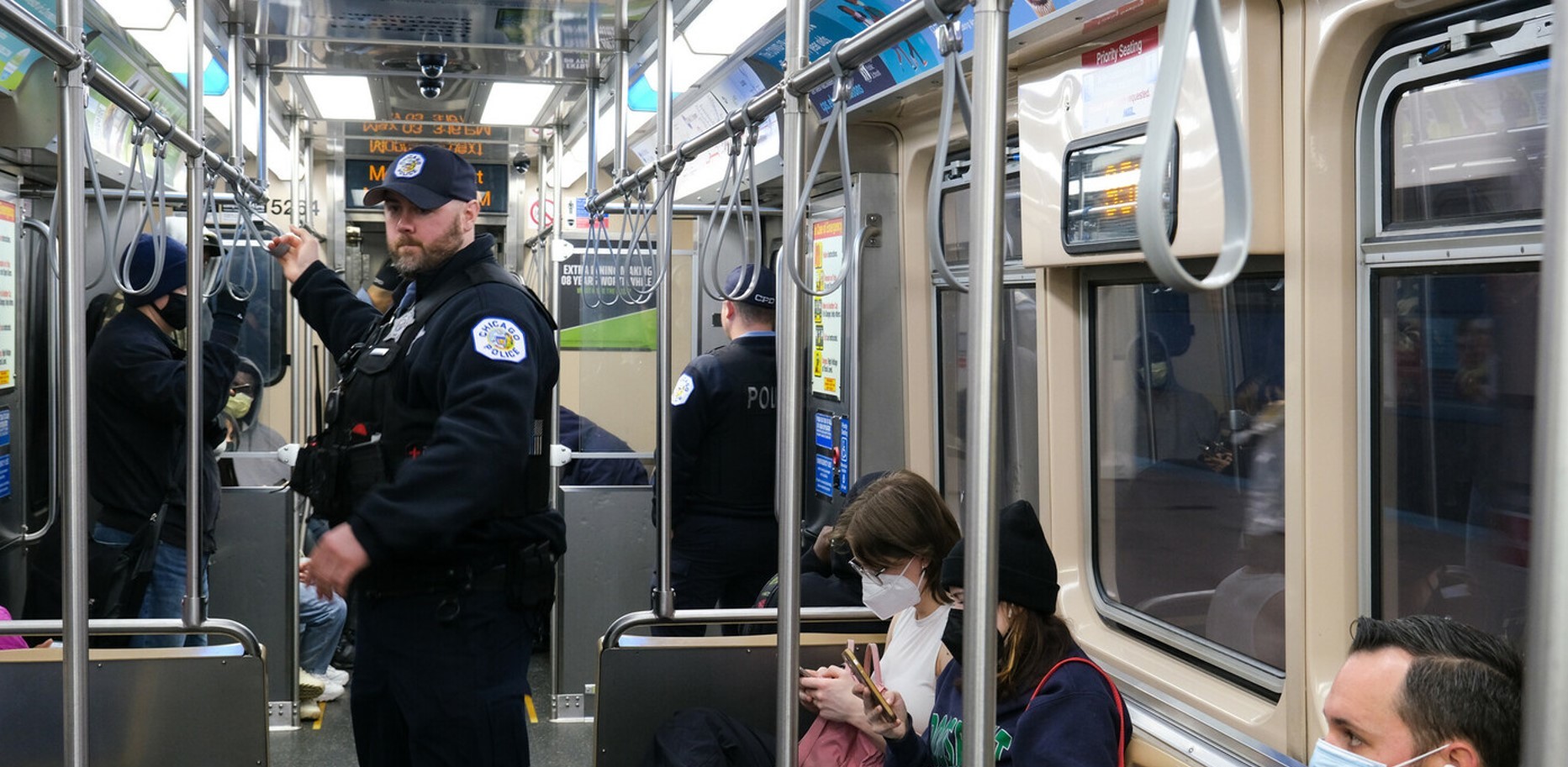 CPD Officers traveling Red Line