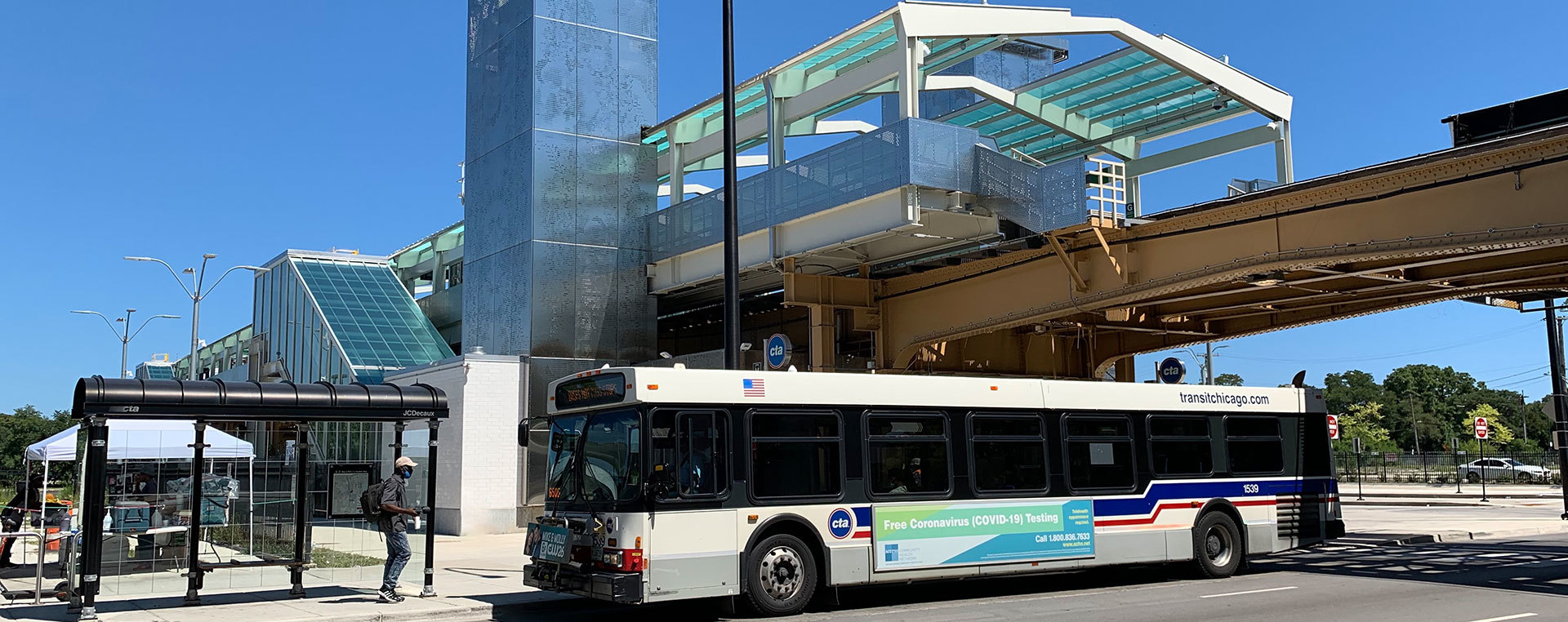 CTA bus in front of station