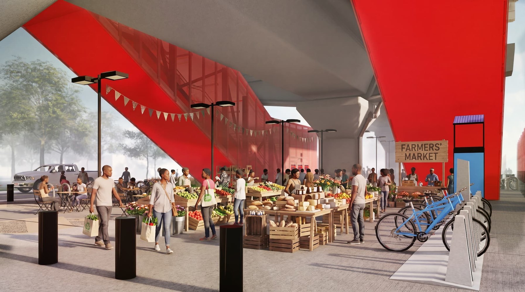 A farmers' market under the elevated structure, with Divvy bikes to the side.