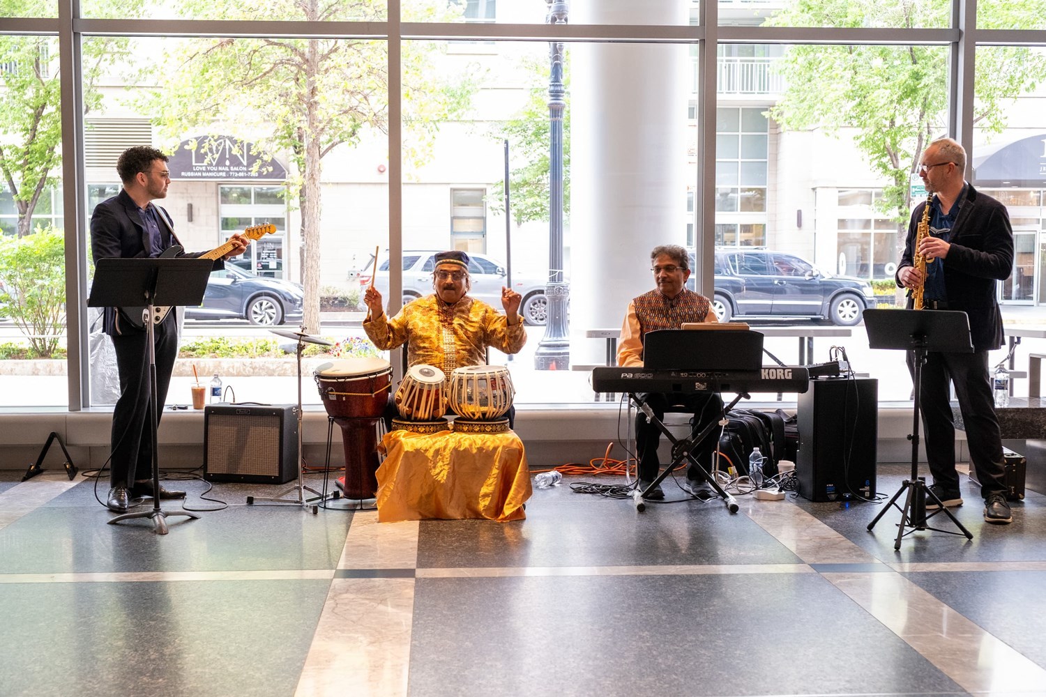 Mandala performing: drums, guitar, keyboard, saxophone