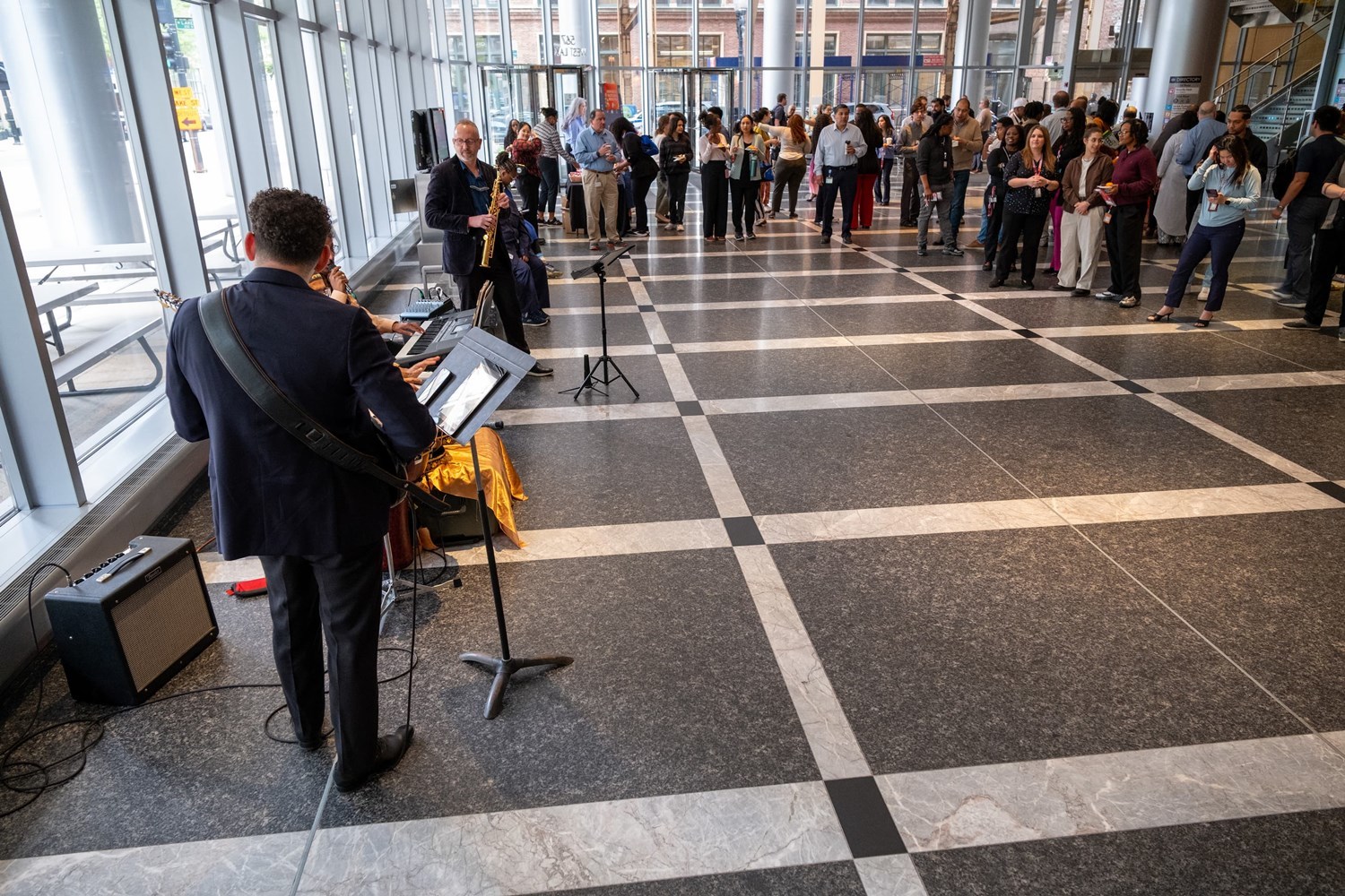 Mandala performing while a crowd watches