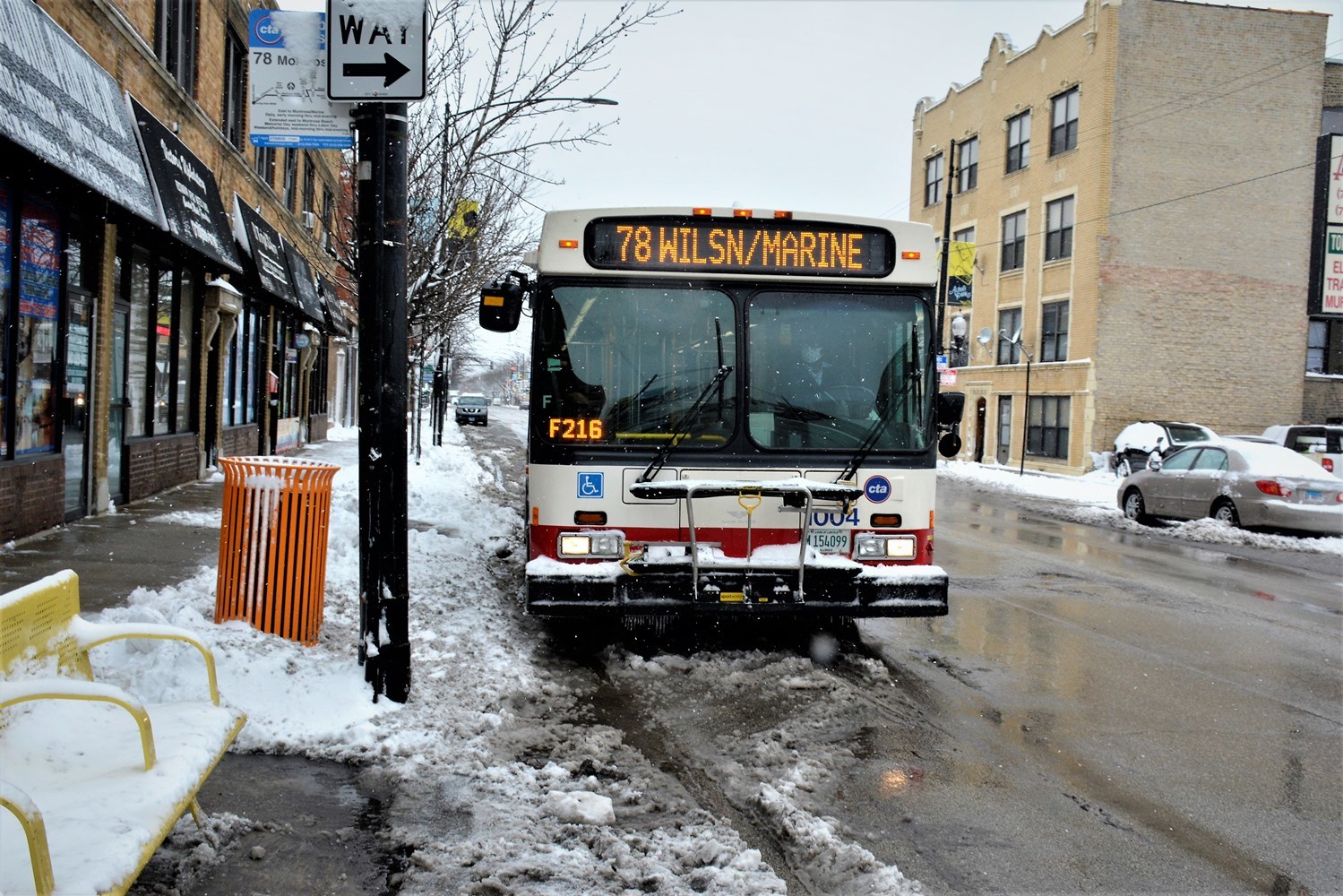A cleared CTA bus stop along the public way allowing customers to safely board buses.