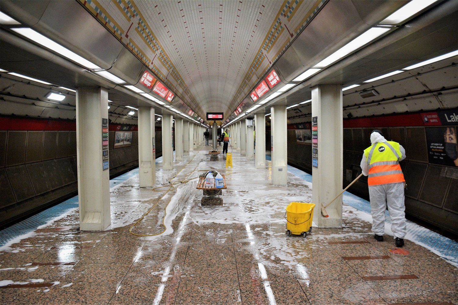 Crews performing a deep clean of a subway station
