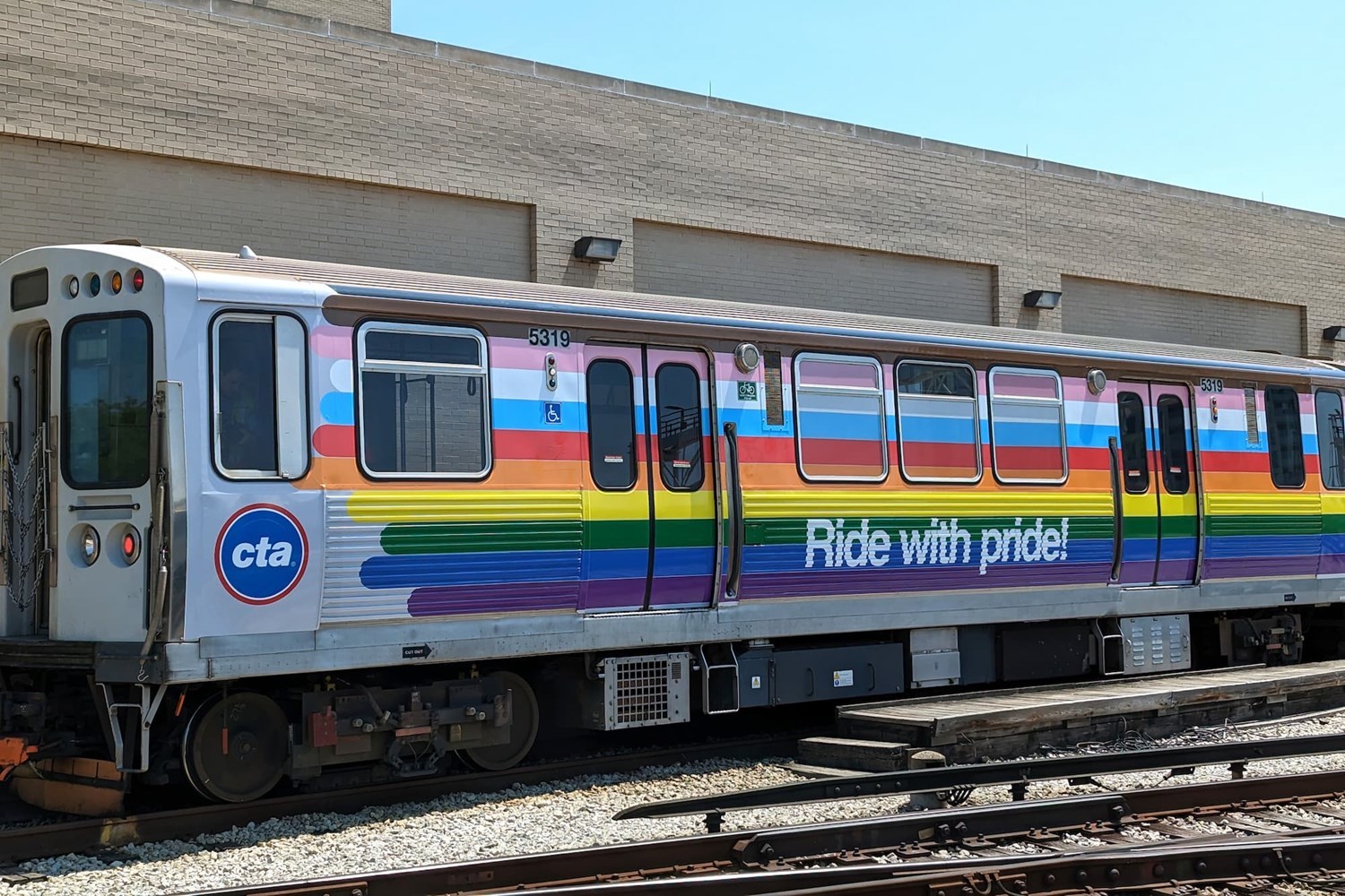 Train car decorated in Pride colors