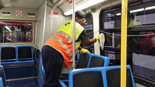 CTA worker cleaning a bus