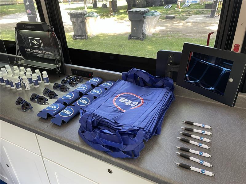 Bags and pens available inside the Community Connection bus.