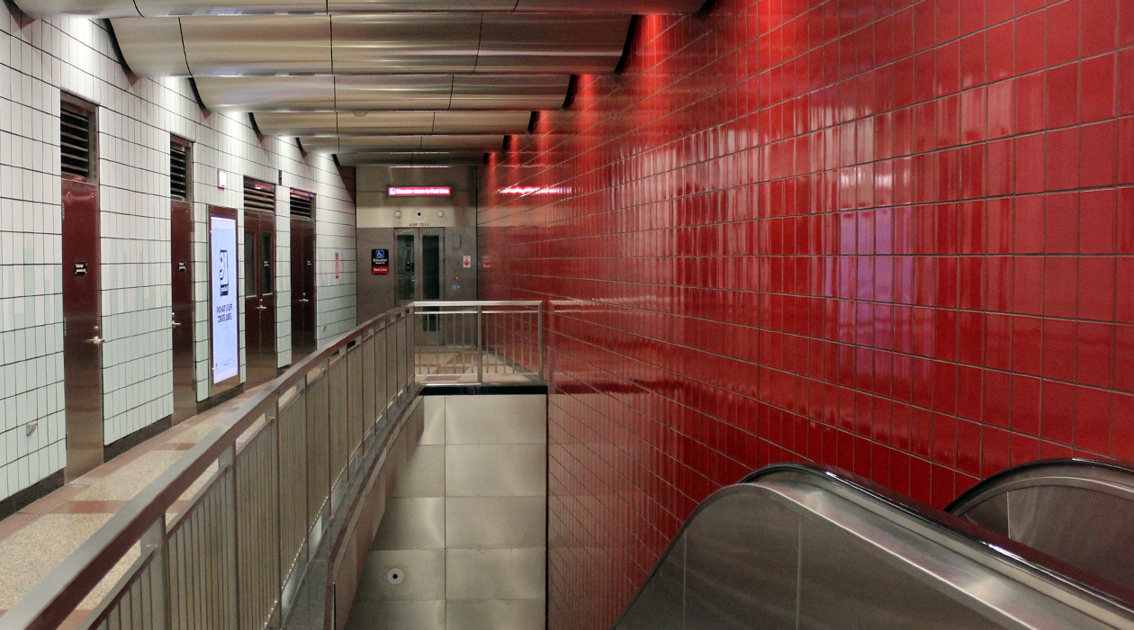 Photo: An elevator and the top of an escalator