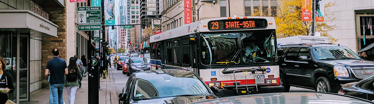Bus driving down State Street