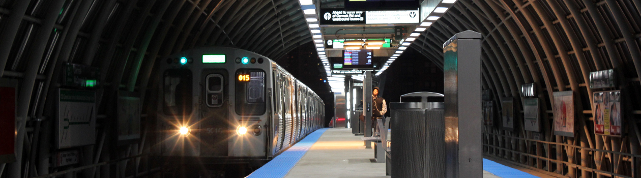 A dramatic photo of the Cermak-McCormick Place platform at night on its opening weekend